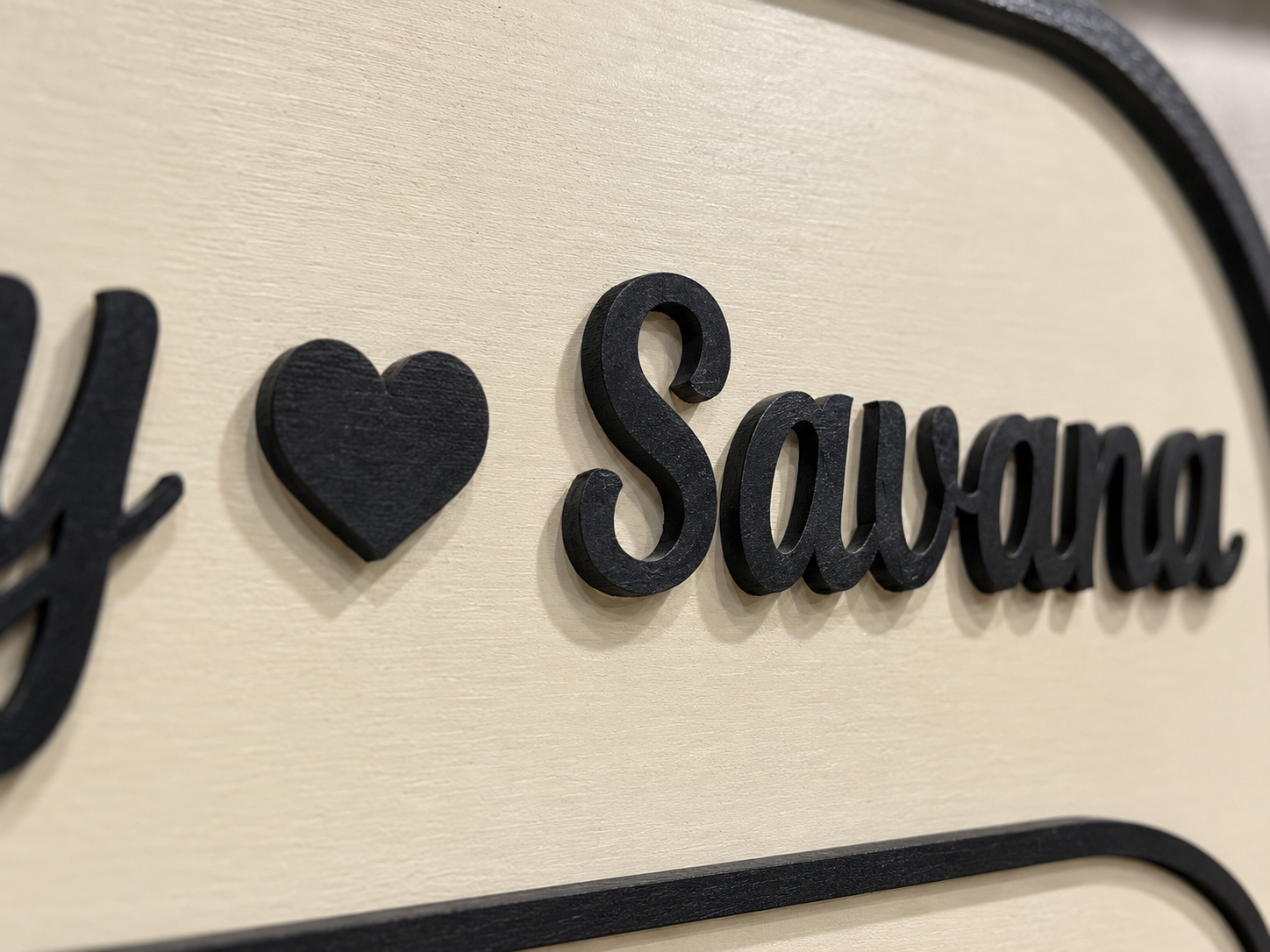 Close-up of the raised custom names and heart detail on a personalized Wedding Vows Plaque, showcasing handcrafted layered wood craftsmanship.